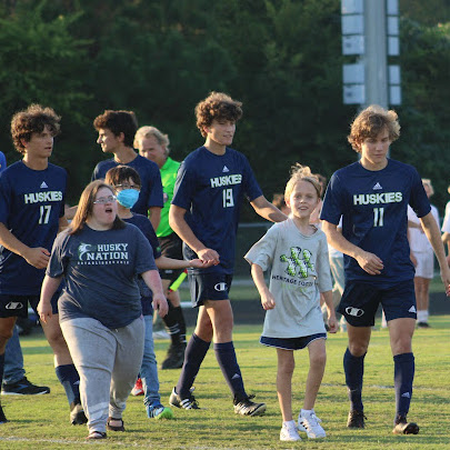  heritage high soccer players and students with autism